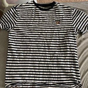 black and white striped tshirt. SUCC brand (idk what that is). size small.